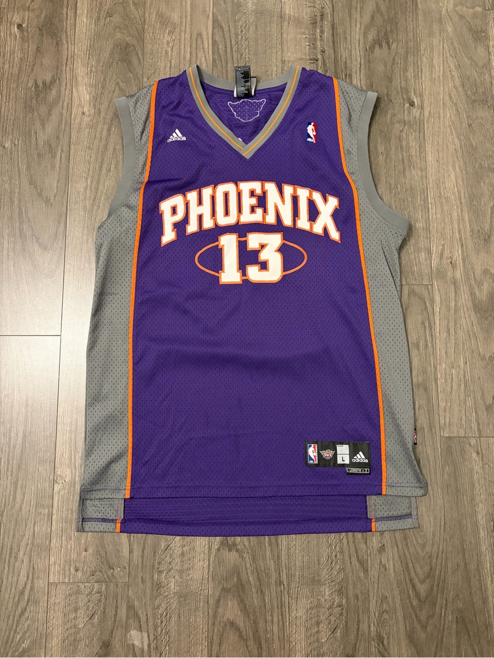 adidas Purple Phoenix Basketball Jersey with Orange Trim